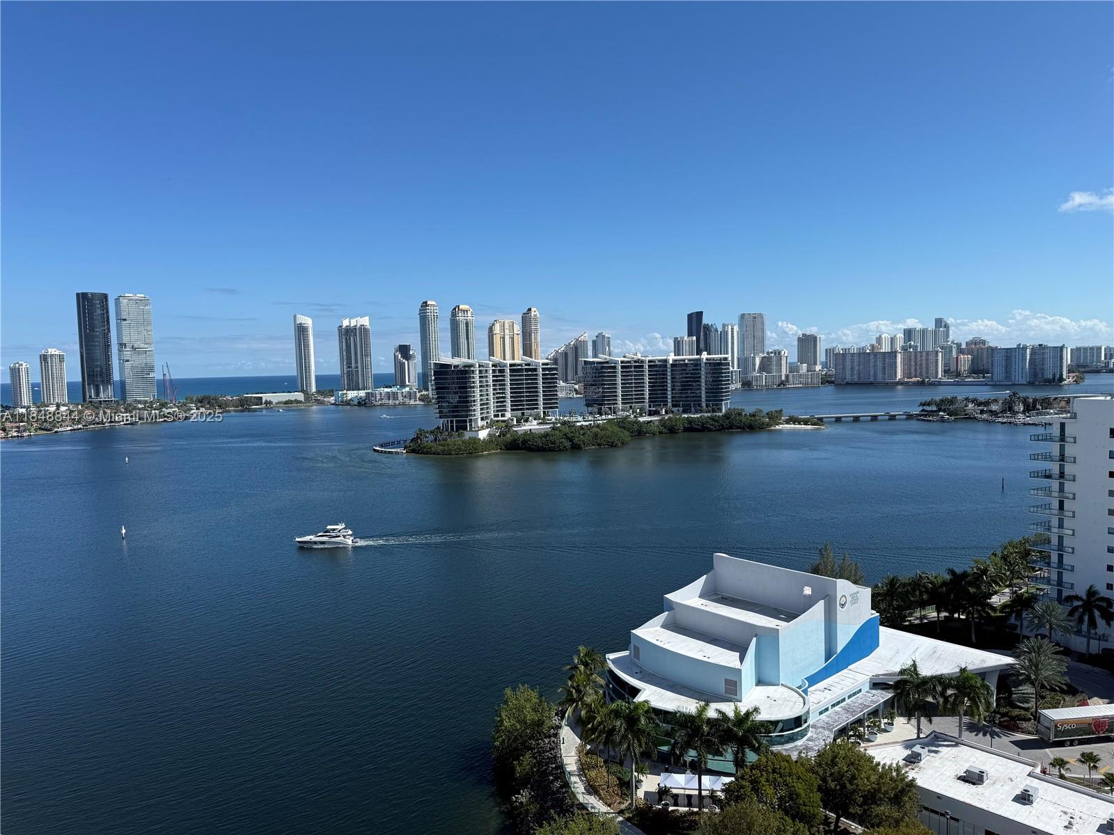 Stunning, bright, updated and beautifully furnished turnkey, spacious, contemporary 3 bedroom, 3 bathroom, Best line of Aventura Marina Two. Daytime soothing intracoastal / ocean views and night time spectacular views of Sunny Isles coastline. This exclusive unit has: private elevator, porcelain floors, marble bathrooms, laundry room. Recent updates include: stylish kitchen cabinets, stone countertops,, wood wall panels, high end lighting, Toto toilet fixtures, new wood sliding closet doors.
Four seasons community paradise offering two beautiful pools, fitness club, marina and it is located steps from Founders Park, tennis, pickle ball, basketball courts, wading pools, soccer / baseball fields, top schools, shopping (Aventura Mall), restaurants, religious and cultural centers.