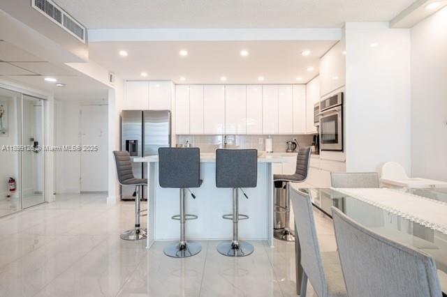 View photos, virtual tours, details... 19370 Collins Ave 608