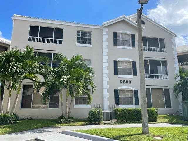 Photo of 2851 N Oakland Forest Dr #102, Oakland Park, FL 33309 (MLS # A12078999)