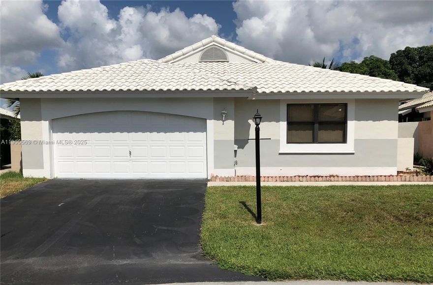 DO NOT MISS THIS OPPORTUNITY! 3/2 SINGLE FAMILY PATIO HOME. LOCATED IN SOUGHT AFTER NEIGHBORHOOD OF WATERFORD IN DAVIE! 2 CAR GARGE WITH VAULTED CEILINGS, TILE FLOORS THROUGHOUT, LARGE MASTER WITH DUAL SINKS. COMMUNITY POOL  AND SITUATED CLOSE TO NUMEROUS  PARKS, SHOPPING AND MAJOR EXPRESSWAY. NO HOA APPROVAL. PETS ALLOWED WITH PET FEE.
