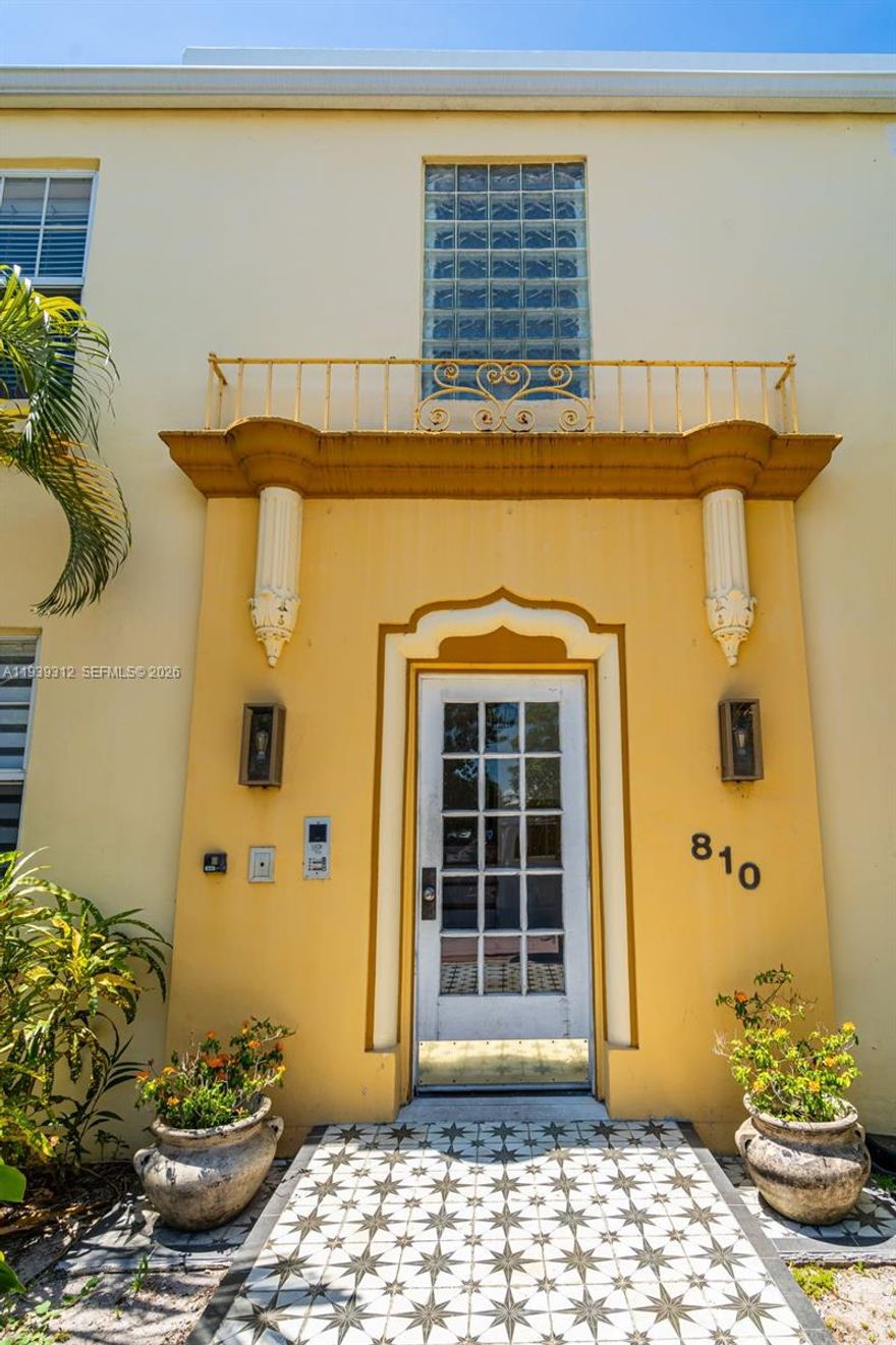 Historic gem in the heart of South Beach. Located in a boutique 1930 Mediterranean Revival building by renowned architects Schoepple & Skinner, this beautifully remodeled residence is one of only four units and lives more like a private home. A rare detached garage with a dedicated EV charger sets it apart. Interior features include wood floors, a quartz-counter kitchen with subway tile backsplash and stainless steel appliances, a separate dining area, a spacious living room, and two bedrooms each with modern en-suite baths. Three exposures flood the home with natural light and tranquil garden views. Ideally positioned across from Flamingo Park and just five blocks from the beach, with shopping, dining, and entertainment nearby. A rare blend of historic character and modern South Beach living.