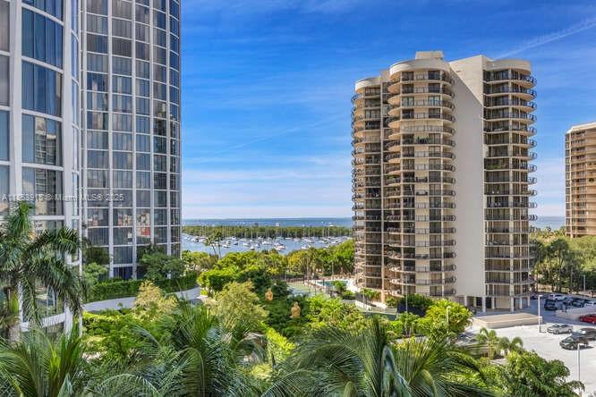 Beautiful 2-bedrooms, 2 bathrooms with a separate dining room/den condo located in the luxurious Club Residences Park Grove which embodies prime Coconut Grove living. The unit features high ceilings, a split floor plan, and a gorgeous oversized private terrace with direct views of sailboat bay. Gourmet kitchen with an open bar counter, Wolf & Subzero appliances, and stunning bespoke countertops. Motorized window and blackout shades, walk-in closets, and beautiful views from each room. Unit comes with one assigned parking. Enjoy 5-star amenities, lush landscaped gardens , 24-hr concierge/valet, business center, fitness center, rooftop pool, spa, theater, onsite restaurant, children's playroom and much more.