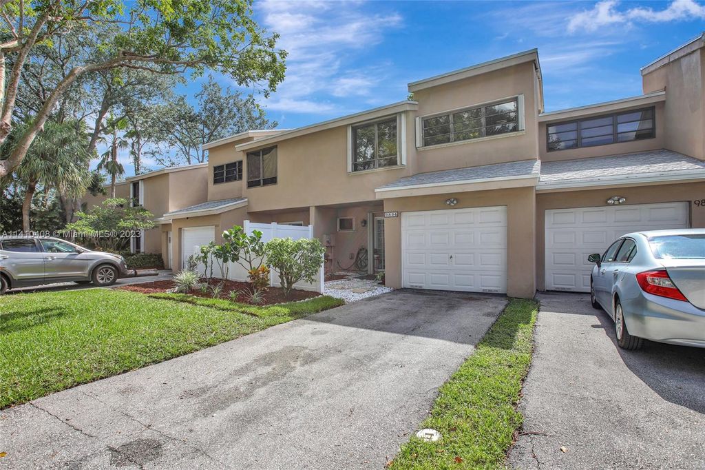 Photo of 9894 Fairway Cove Ln, Plantation, FL 33324 (MLS # A11410408)
