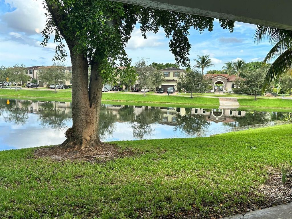 Photo of 5672 Rock Island Rd #240, Tamarac, FL 33319 (MLS # A11890685)