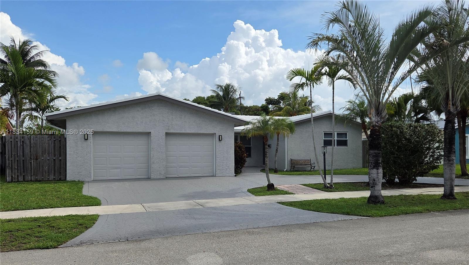 Great 4bed 3bth 2car garage pool home on quiet cul-de-sac off Diplomat Parkway. Nestled amongst the multi-million dollar estate homes in east Hollywood you'll find tranquility waiting. 2 master suites, Living Room, Dining Room, full Eat-in Kitchen with island and a full separate pantry. Full utility room complete with utility sink and LG washer and Dryer. Natural Gas appliances throughout; Dryer, stove, 80 gal hot water heater plus instant hot heater for master bedroom, BBQ hookup, pool heater hookup, and generator hookup. 1300sqft screened in pool and patio. Impact windows throughout. New A/C for main house and separate A/C for primary bedroom. New flat roof. New gutters all around.