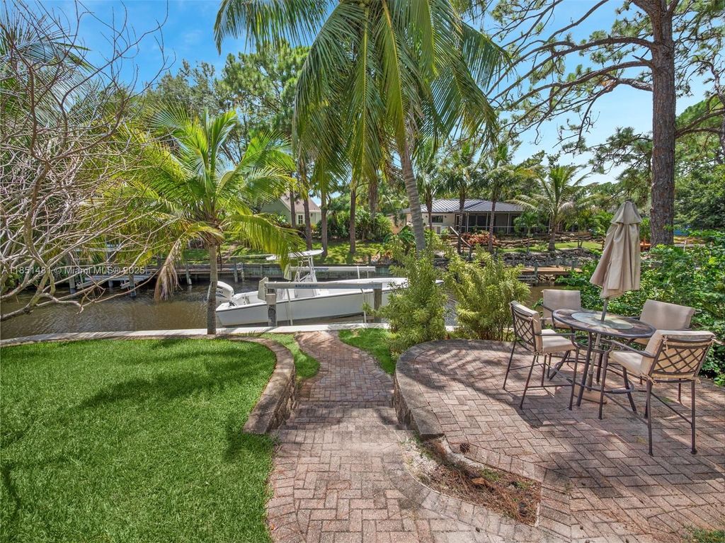 Photo of 1338 SW Evergreen Ln, Palm City, FL 34990 (MLS # A11851481)