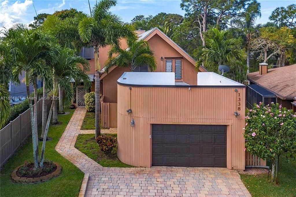 Photo of 1338 SW Evergreen Ln, Palm City, FL 34990 (MLS # A11851481)