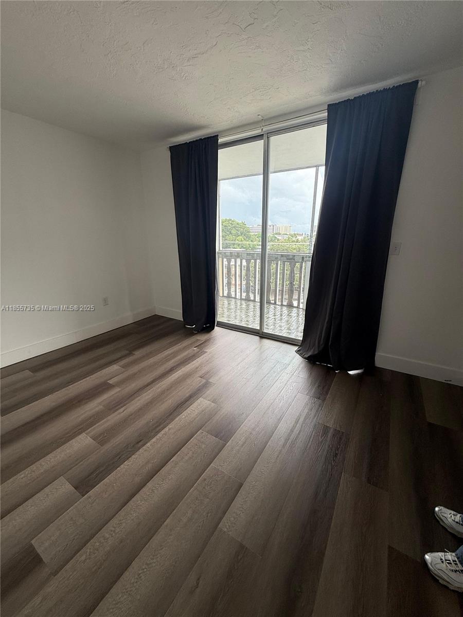 Fantastic opportunity to own a bright and spacious 1-bedroom, 1-bath unit located near 1475 NE 125th Terrace in North Miami. The condo features a comfortable living room with dining area, a beautiful and functional kitchen with a service door, and a sunny bedroom with access to a private balcony. The unit is filled with natural light throughout. Ideal for investors – currently rented through August 15th, 2025. The building offers gated access, assigned parking, a pool, elevators, and laundry facilities on every floor. Conveniently located just minutes from Biscayne Blvd, I-95, public transportation, and shopping centers