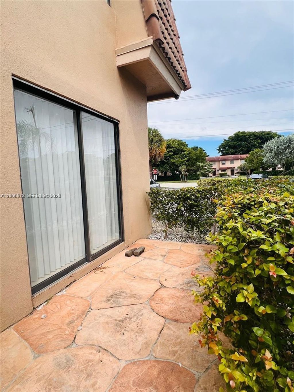 Photo of 10878 Royal Palm Blvd #10878, Coral Springs, FL 33065 (MLS # A12006578)