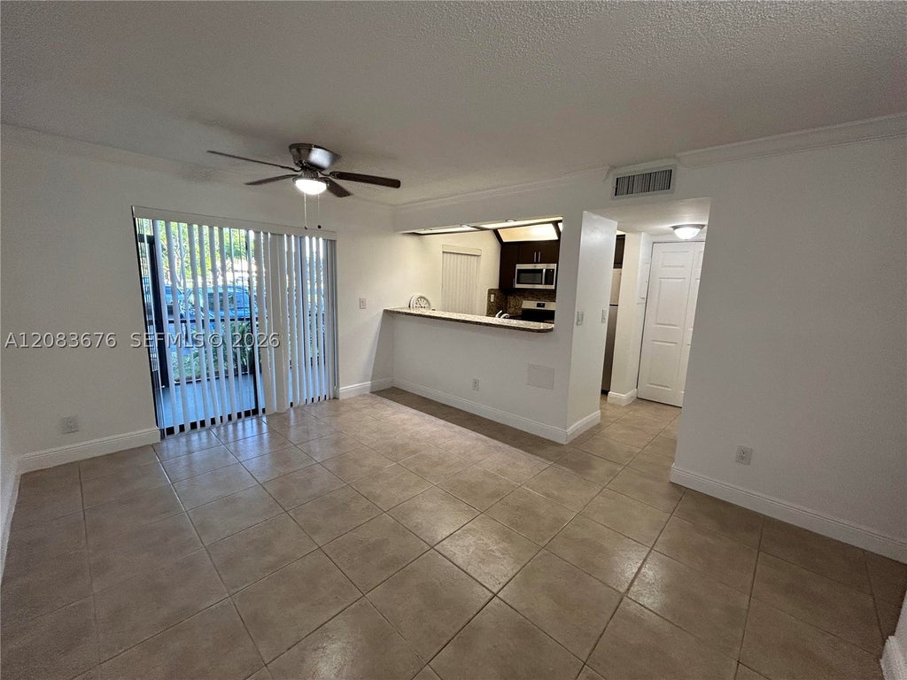 Photo of 3410 Foxcroft Rd #101, Miramar, FL 33025 (MLS # A12083676)