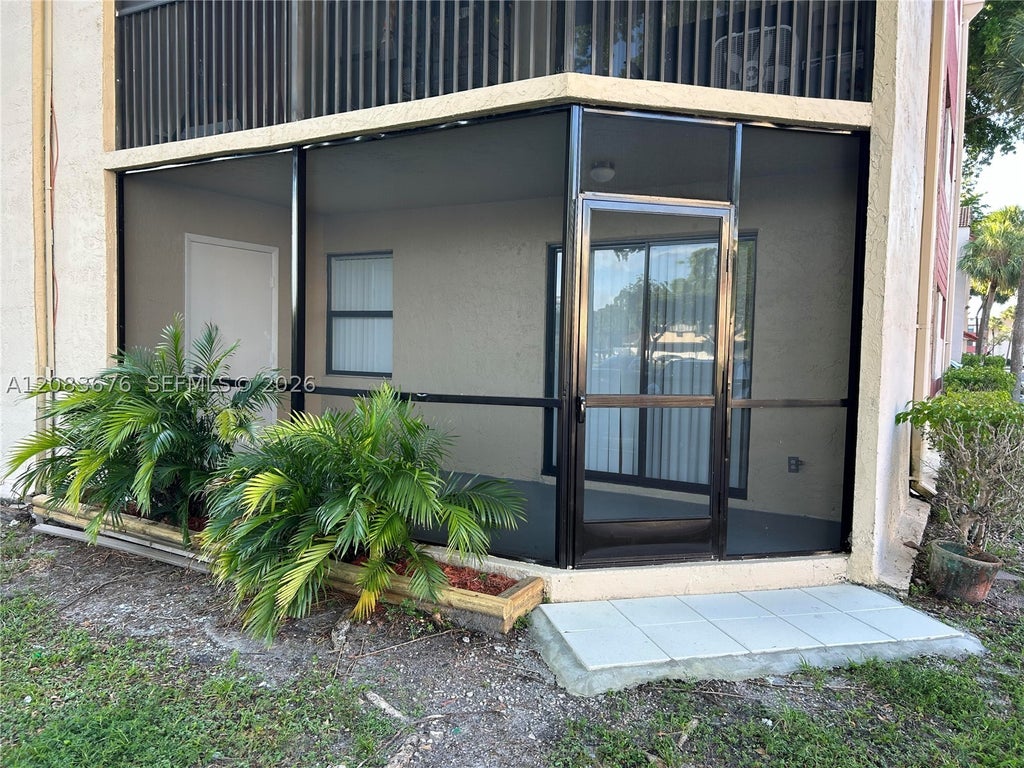 Photo of 3410 Foxcroft Rd #101, Miramar, FL 33025 (MLS # A12083676)