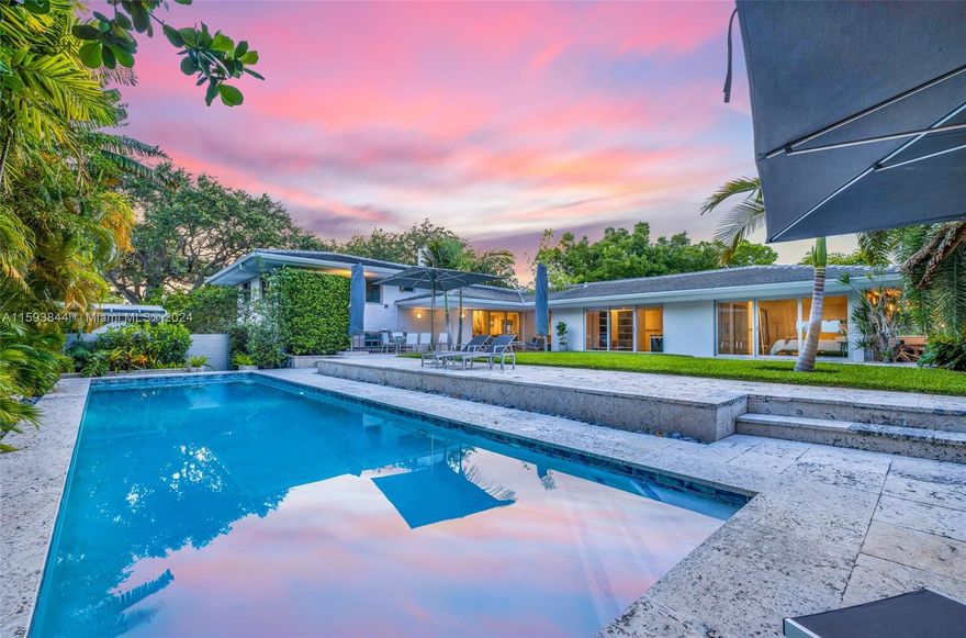 Welcome to your stunning modern-mid century Miami Shores masterpiece just a 3 min drive from Top rated schools such as highly acclaimed Miami Country Day School and close to The Cushman School, perfect for families seeking top-tier education. This exceptional 3,600 sqft residence, nestled on an oversized 15,000 sqft corner lot, was thoughtfully designed by the renowned architect Wahl Snyder, credited with introducing the split-level house to Florida.Embrace the seamless indoor-outdoor living experience, boasting a sprawling pool & jacuzzi surrounded by lush landscaping. The spacious home features 5 bedrooms and 4 bathrooms, offering ample space for comfortable living & entertaining.Grab this unparalleled opportunity to own a piece of architectural history in a prime Miami Shores location.