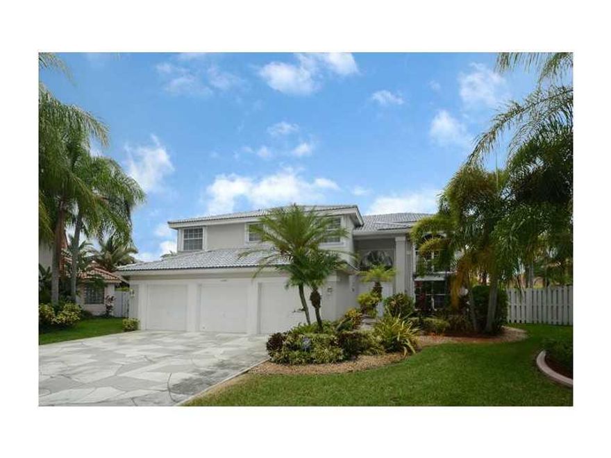 Stunning 4 Bedroom + Loft Home Located On Oversized 11,000 Sq Ft Cul De Sac,  Freeform Open Pool W/Spacious Patio & Covered Awning perfect for outdoor relaxing. Fenced & Landscaping yard For Added Privacy, 3 Car Garage. Master Suite On The First Floor.  L ots Of Extras Include Accordion Shutters 2012. 2 Ac Units (One Brand New) . Roof 2010. New Water Heater. Dryer 6 Mo. Carpet Only 6 Months New. Service Contract Included. Community Pool & amenities