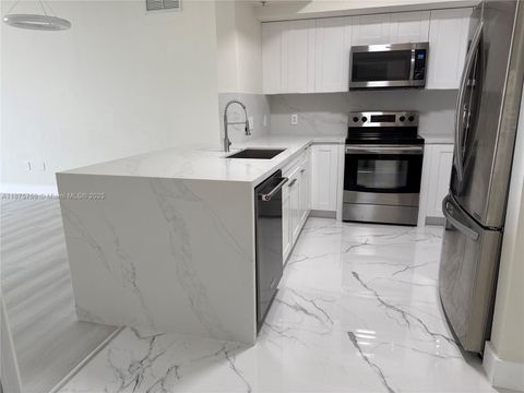 Photo of 888 S Douglas Rd #1502, Coral Gables, FL 33134 (MLS # A11875759)