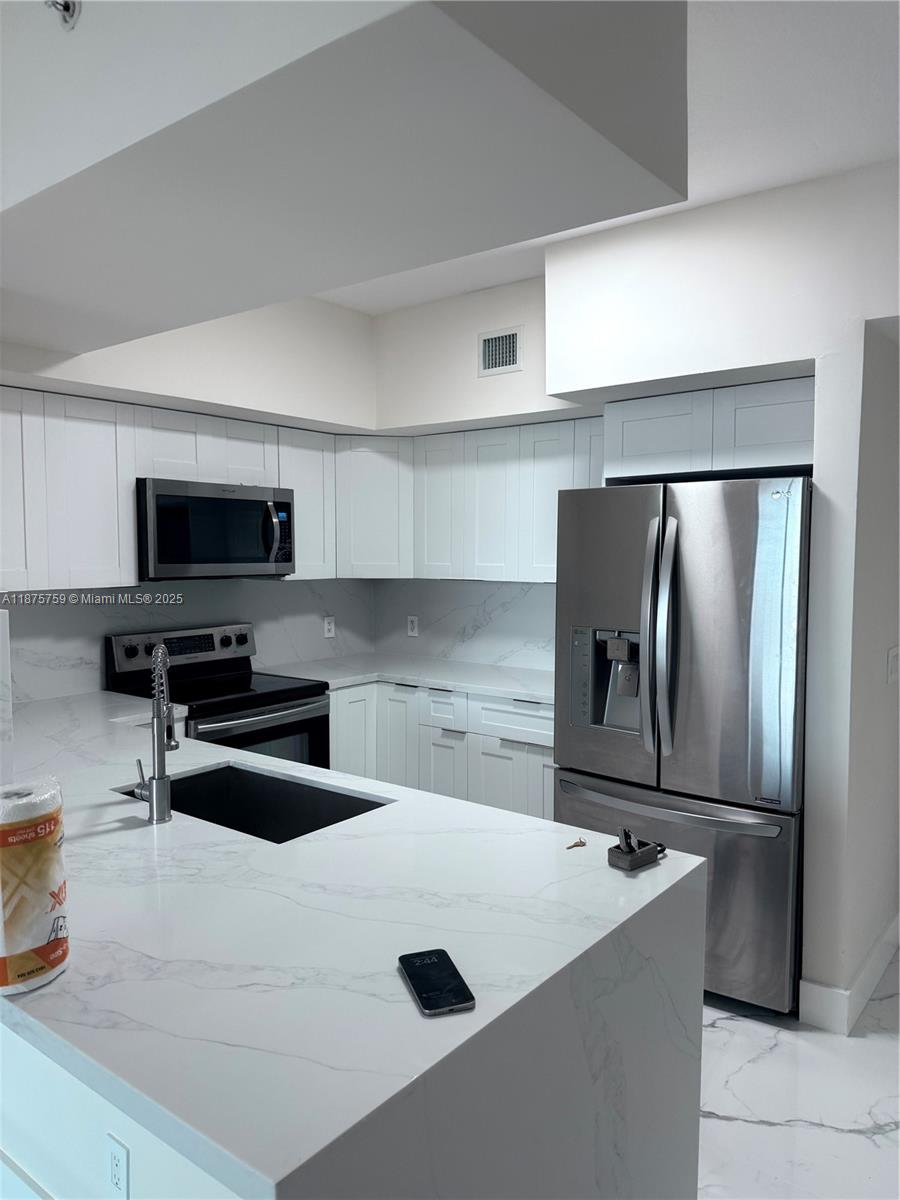 PUERTA DE PALMAS CONDO - Residential