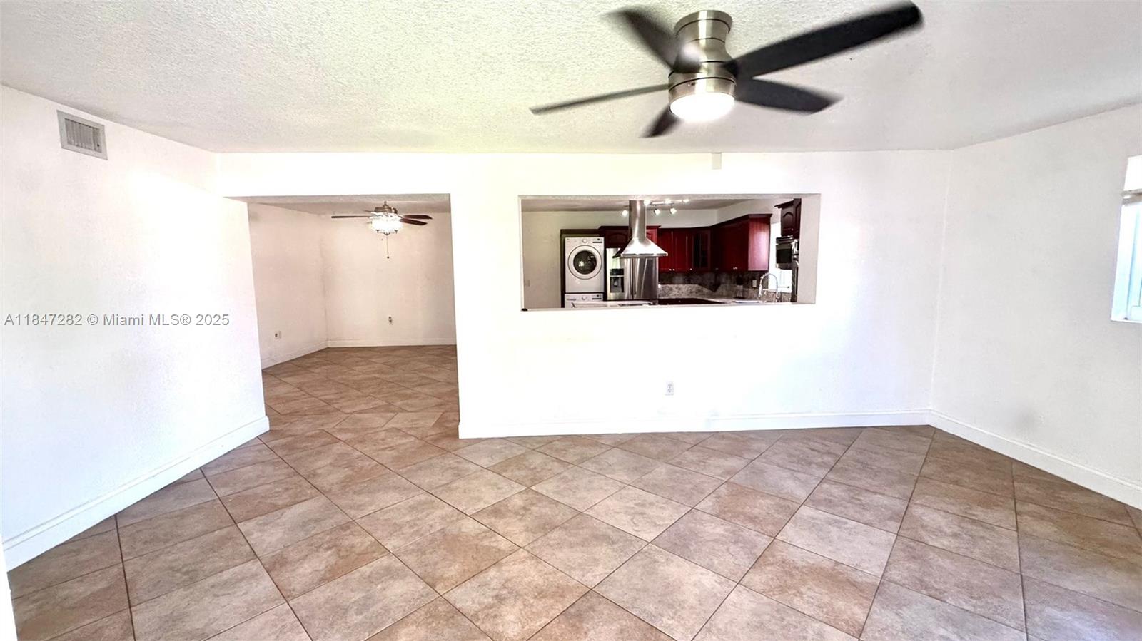 Beautiful and spacious efficiency that feels just like an independent apartment! Features two bedrooms and two full bathrooms, a modern and open kitchen, a bright living room, and an additional hall area. Enjoy the comfort of a private, oversized patio with green space, ideal for outdoor relaxation or entertaining. A truly unique opportunity!