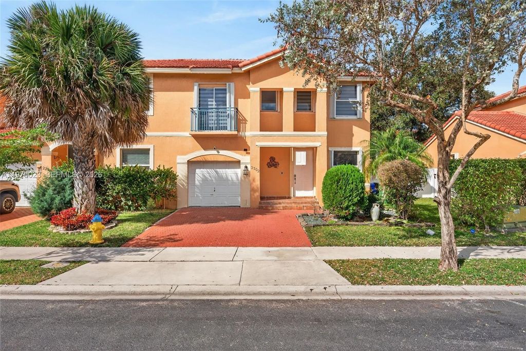 Photo of 2302 NW 161st Ter, Pembroke Pines, FL 33028 (MLS # A11970023)