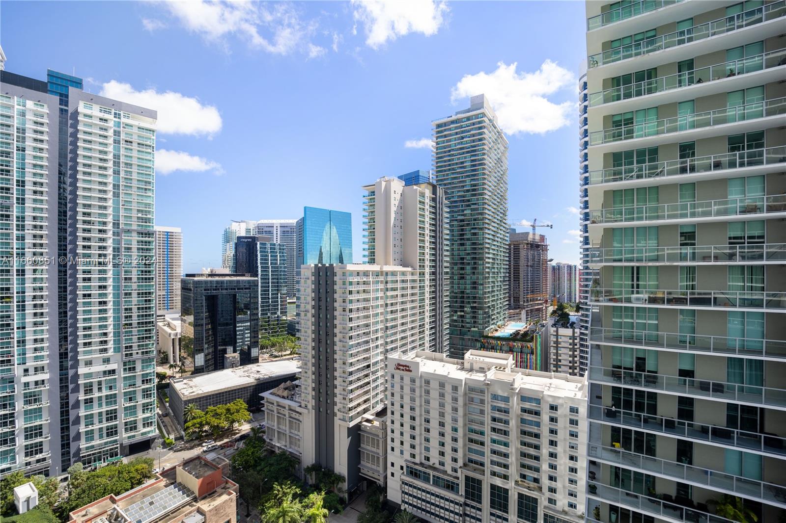 The Axis on Brickell - North Tower / 2 Beds / 2 Baths / 1,024 sq. ft. of living area / Floor to Ceiling Glass Window and huge balcony / Access to Balcony from Master Bed, 2nd Bed & Living Room / Master Bath with Tub, Shower & Double Sink / Stainless Steel Appliances / Washer and Dryer inside the unit. Building Features: Fitness Center, Spa, Lap and Infinity Edge Pools, Theater Room, Business Center, BBQ Area, Kids Room. Short drive to Miami International Airport & Miami Beach!