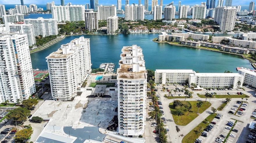 Large 1565 SQ FT floorplan in Del Prado w/ water view at the best price! Big Upgraded Walk in Closets, Updated baths,  Updated Wood / Granite Kitchen w/ breakfast area. Smooth Ceilings, Tile & scratch proof wood floors. A/C 2021. 1 Garage Parking Space, 1 storage unit. Guard Gated Community w/ Marina & boat docks available. Great Amenities in process of being upgraded: Gym, Sauna, 2 Swimming Pools, Tennis, BBQ area, fishing Pier, Valet for guests. Renovation includes 40 yr cert, concrete restoration, hallways, garage. Can lease once per year after 12 months of owning. Max 2 Domestic Pets under 25lbs. Great Location in Aventura near all shops, Brightline Station, entertainment, Lehman Causeway, Beach.