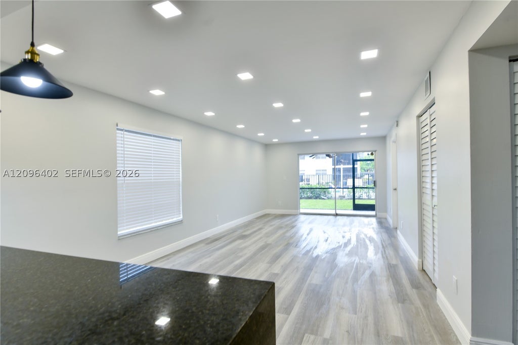 Photo of 905 Southridge Rd #101B, Delray Beach, FL 33444 (MLS # A12096402)