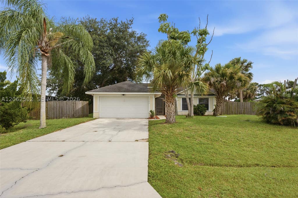 Photo of 1262 SW Lawndale Ave, Port St Lucie, FL 34953 (MLS # A12062502)