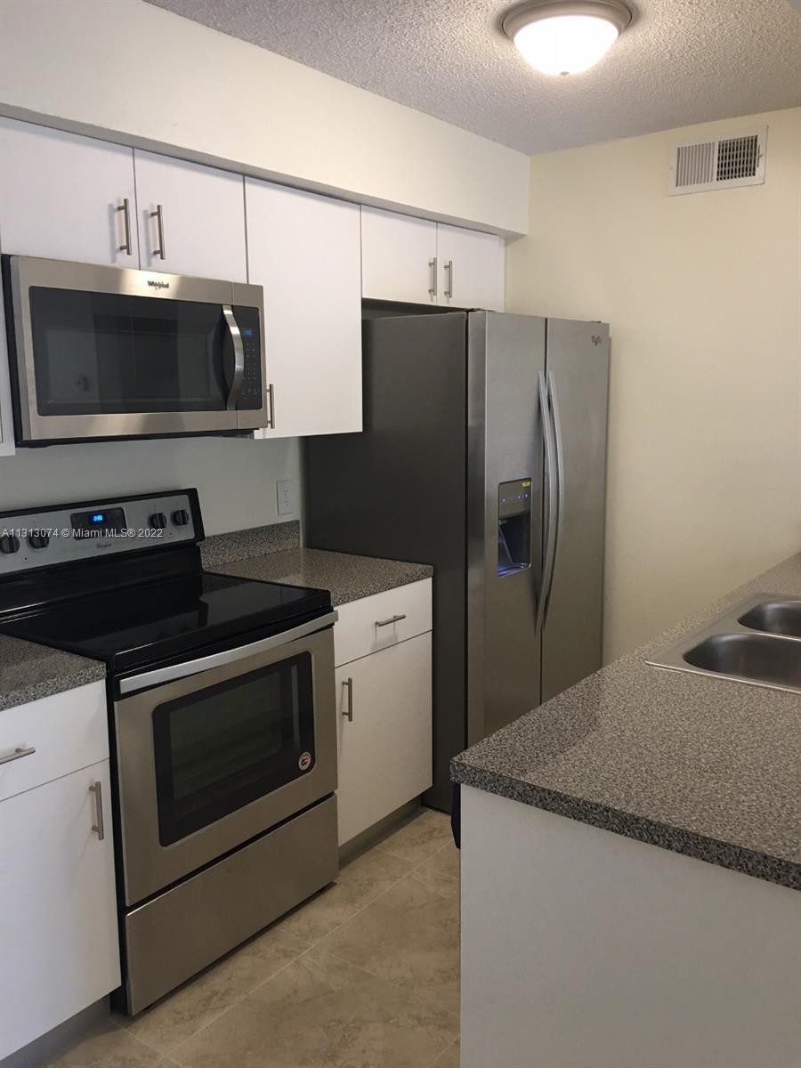 Nice 1st Floor 2 Bed/2 Bath unit in the quiet community of Mystic Gardens. Washer & Dryer in the unit; Stainless Steel appliances, tile throughout the unit, screened patio with storage. Community has clubhouse, heated swimming pool, tennis court. Easy to Show