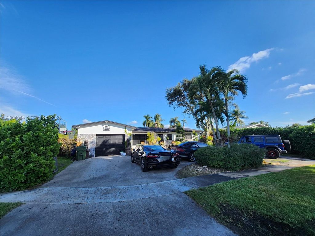 Photo of 2251 NW 87th Ter, Pembroke Pines, FL 33024 (MLS # A12004044)