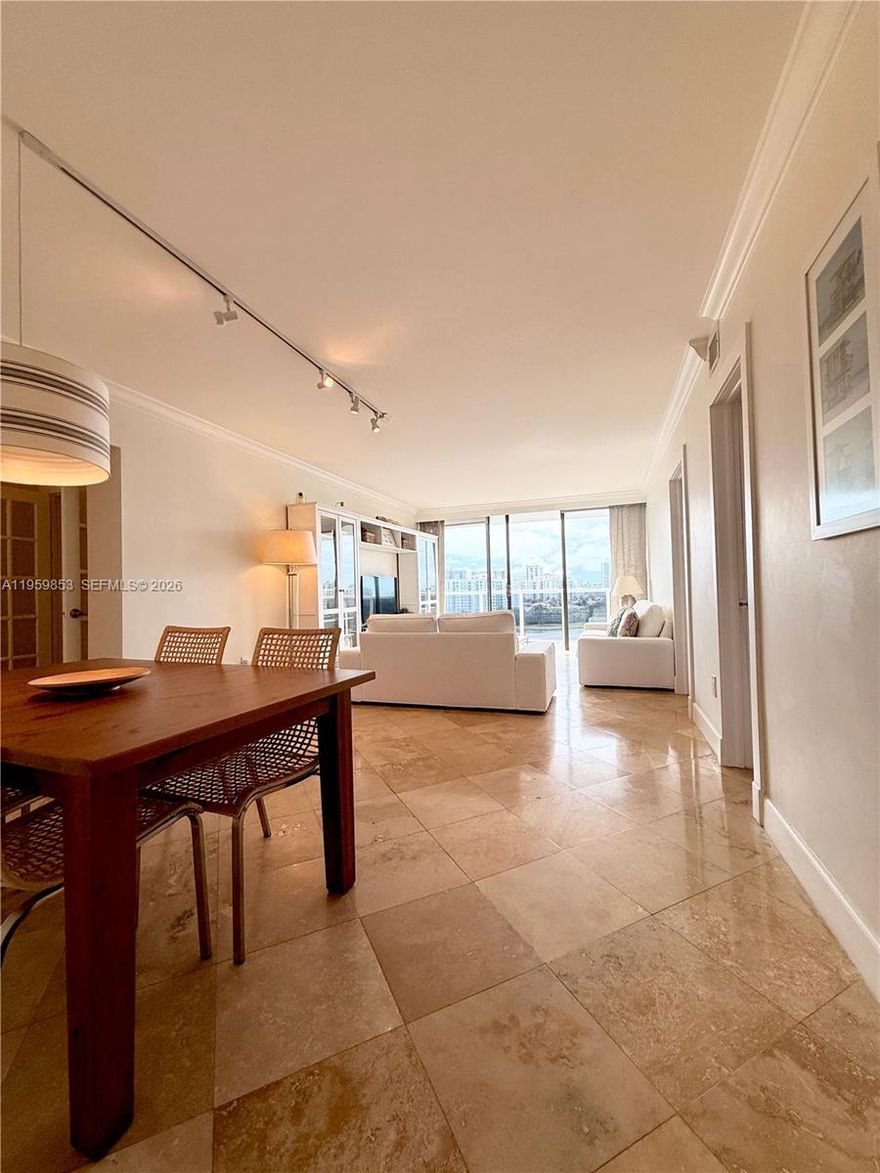 Situated in a peaceful and welcoming building, this spacious 2-bedroom, 2-bathroom apartment offers stunning views of the ocean and golf course. Located on the prestigious Country Club Drive in the heart of Aventura, it features expansive floor-to-ceiling windows and two private balconies. With low condo fees, this apartment combines affordability with luxury. Just a short walk to shops and restaurants, and only 5 minutes from the beach. Enjoy the 3.5-mile bike and walking path right across the property. Experience the best in convenient and luxurious living!