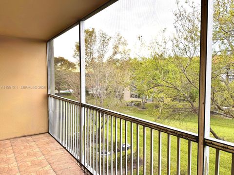 Photo of 13355 SW 9th Ct #313H, Pembroke Pines, FL 33027 (MLS # A11991311)