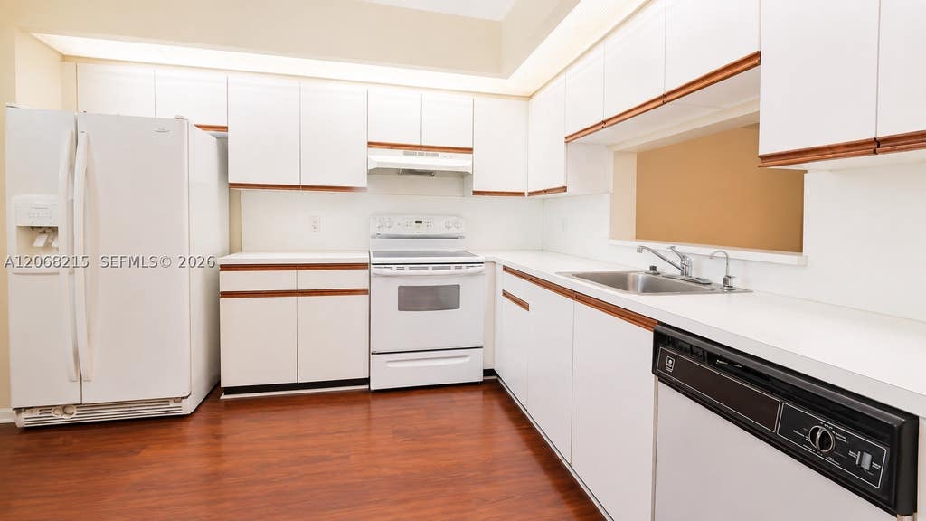 Photo of 700 SW 128th Ave #209C, Pembroke Pines, FL 33027 (MLS # A12068215)
