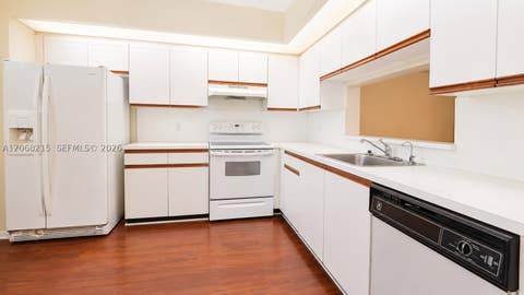Photo of 700 SW 128th Ave #209C, Pembroke Pines, FL 33027 (MLS # A12068215)