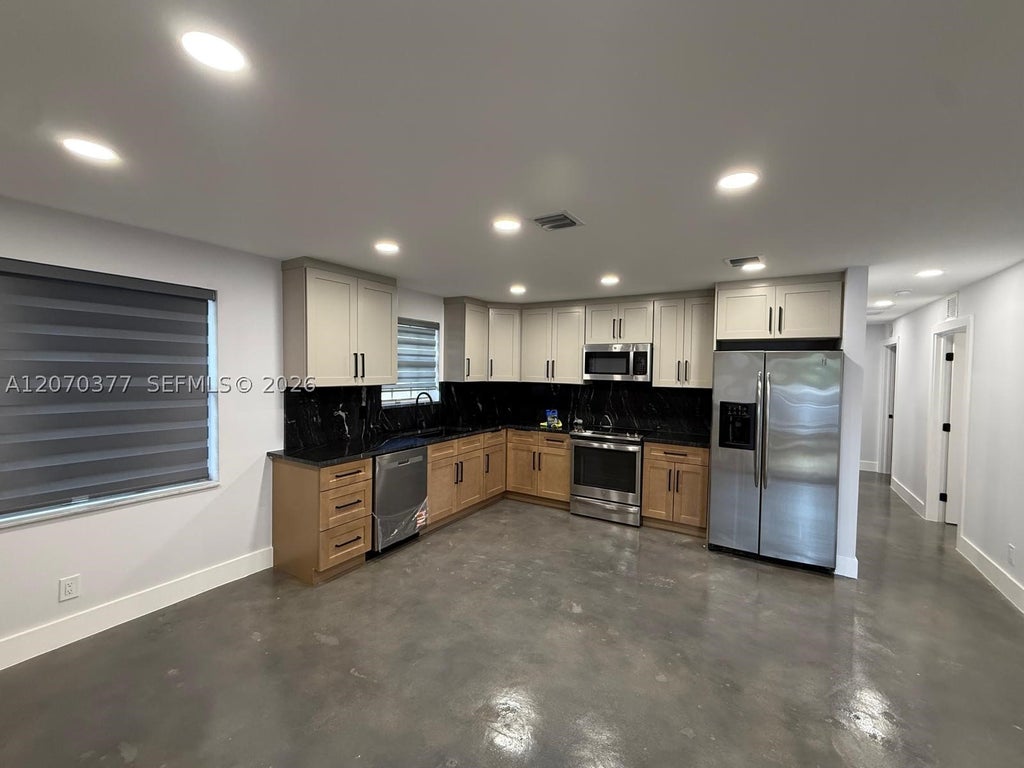 Photo of 17 SW 6th Ave #17, Dania Beach, FL 33004 (MLS # A12070377)
