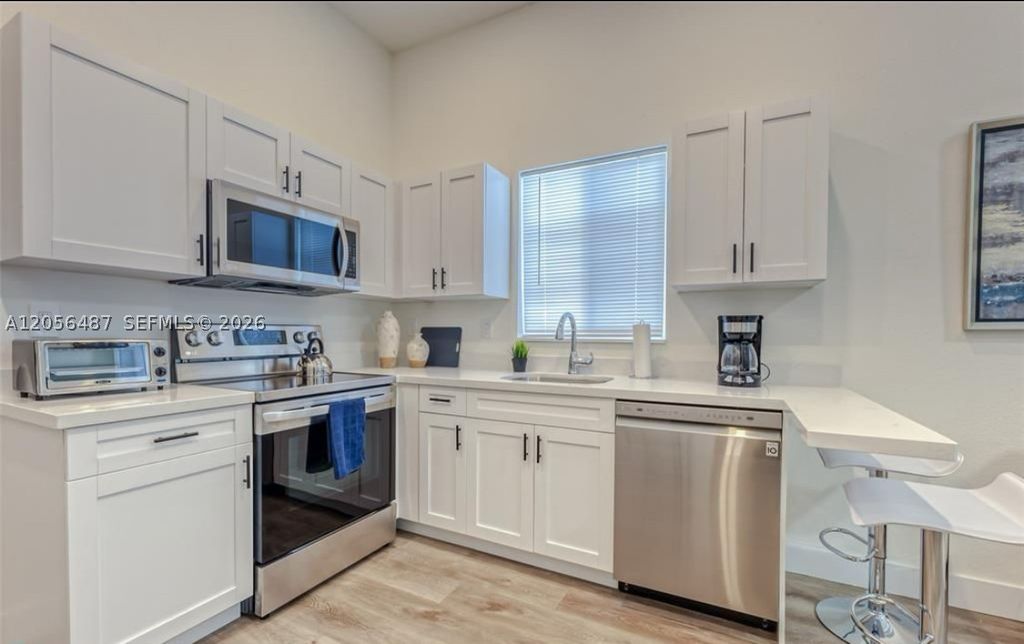 Photo of 830 SE 14th St #1, Fort Lauderdale, FL 33316 (MLS # A12056487)