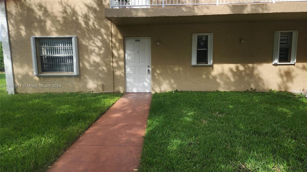Photo of 9929 Twin Lakes Dr #26-A, Coral Springs, FL 33071 (MLS # A11697911)