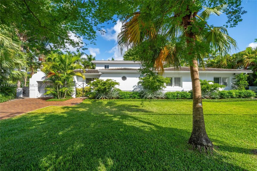 This stunningly remodeled home features 100’ of water frontage with Bay access in the heart of Coral Gables, close to everything! The 4 BR, 4 BA  property spans 3,619 SF on a lush 12,000 SF lot.  Enter through a charming courtyard to find a wonderfully open-concept floor plan w/ a fabulous kitchen including high-end appliances & large island, ample living room, and dining room w/ beautiful built-ins. Spanning the back of the house is a deep covered patio that overlooks the pool & waterway beyond! Upstairs, the private primary suite includes an office, sizable BR, 2 walk-in closets, & lovely BA.  Downstairs you will find 3 add’l BRs with walk-in closets, & 3 BAs. With impact glass throughout, fabulous updates & more, this is an incredible opportunity not to be missed!