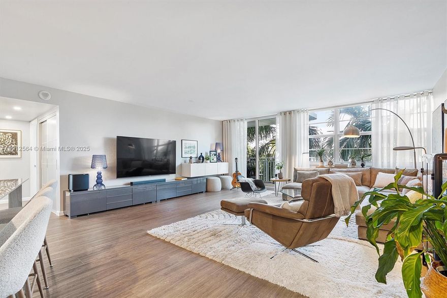 The BEST UNIT in Bayview Towers, North Miami! This 1,188 sq ft 2-bed, 2-bath condo is completely renovated with high-end materials. Enjoy the open-concept layout integrating the living, dining, and state-of-the-art kitchen (featuring a spacious island). Impact windows and a NEW A/C unit ensure maximum comfort. Two ample bedrooms, two fully renovated baths. Can be sold furnished! The building offers fantastic amenities: heated pool, gym, and 24/7 security. Pet-friendly. Excellent location: walk to shops/dining; minutes from Bal Harbor & Surfside beaches. Low HOA includes cable/internet/water. A true luxury gem, Owner been relocate back to Italy take advantage of this opportunity