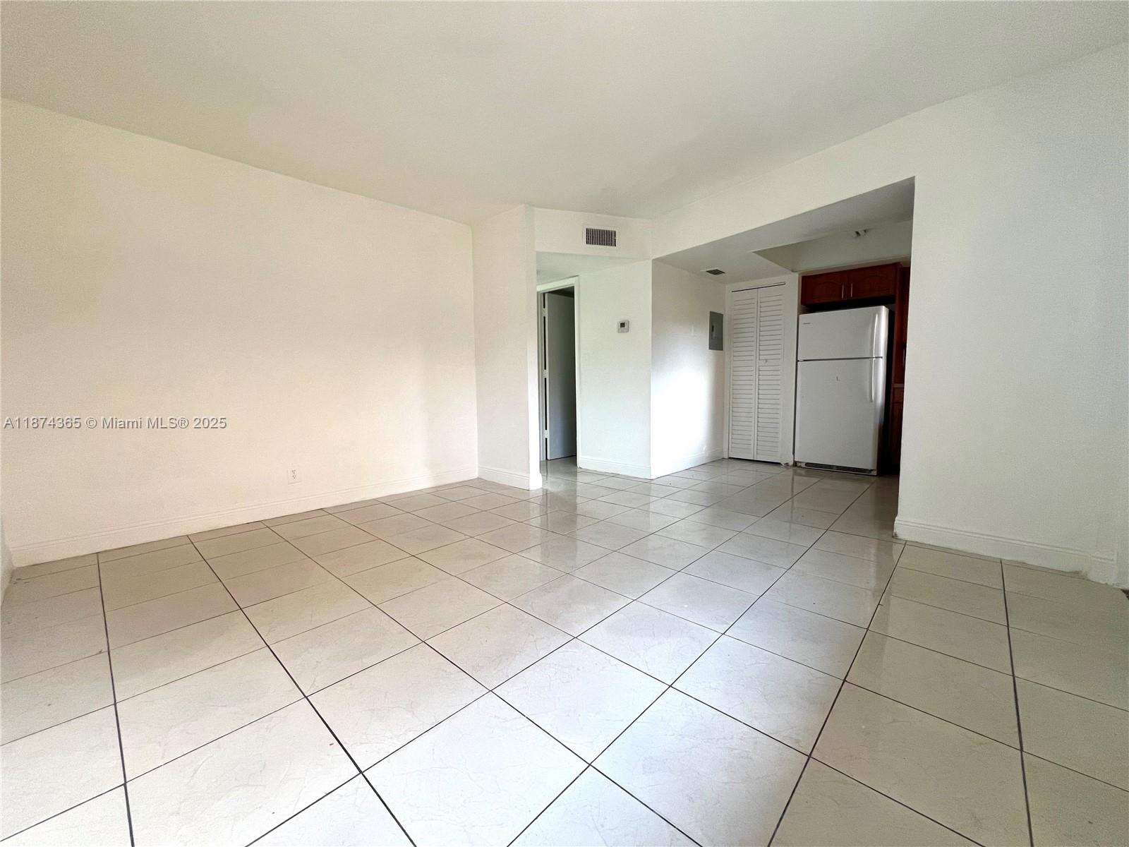 Upgraded move-in ready 2/1 condo at an affordable price. All tile flooring, lots of natural light. Parking right in front of the unit. Great location. Don't miss it.