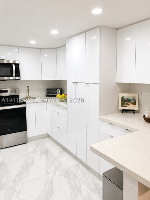 Photo of 9735 NW 52nd St #305, Doral, FL 33178 (MLS # A12100281)