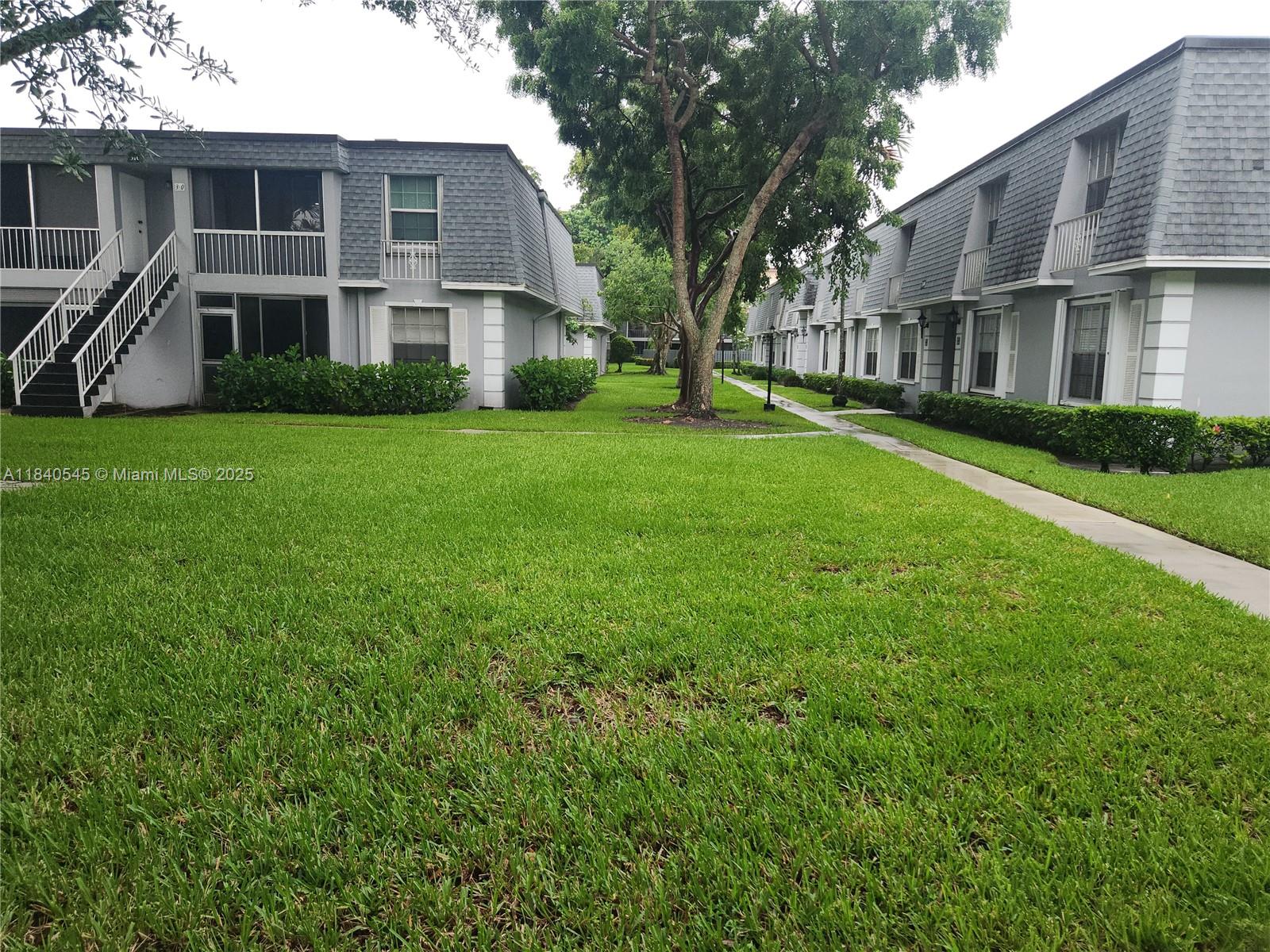 **Rarely Available** Discover the perfect balance of comfort & convenience in this spacious 3/2 condo, located on the first floor. Living room, dining room & separate family rm. Double oven, new electric panel, newer ac unit, laminate flooring throughout, full sized washer and dryer, screened patio & accordion shutters. Lots of closets including an exterior storage unit. This rarely available, largest unit in development is move-in ready and awaiting your personal touch. Well-cared-for community with an inviting pool and BBQ area just steps away. There is ample guest parking. Ideally situated and can walk to shopping, restaurants, and more. An unbeatable combination of quality, convenience, and value. Close to major roads, 20 minutes to beach and airport!