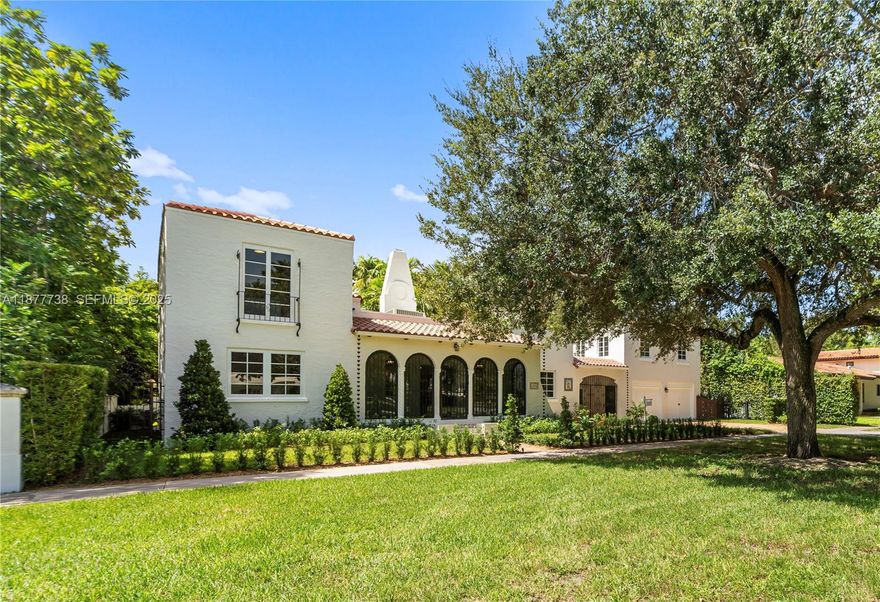 Step into an impeccably renovated 1925 Coral Gables gem that blends historic charm with modern luxury. This home has been completely upgraded with new roof, impact windows, electrical, plumbing, AC, marble and porcelain bathrooms, kitchen, appliances & more. The main house offers 3 spacious bedrooms with a private, 2nd floor master suite. The living room features a marble fireplace with archways into the dining room & sunken Florida room. The beautifully restored oak floors, charming sunroom, vaulted wood ceilings, & intricate arches throughout exude old Spanish charm. A porte coche separates additional living space & a 1-bedroom guesthouse. A turn key residence in the heart of Coral Gables walking distance to the Granada golf course & Country Club, 5 min. to downtown / 10 min. to airport.