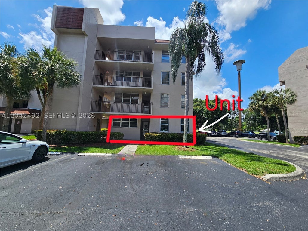 Photo of 9520 Seagrape Dr #106, Davie, FL 33324 (MLS # A12042492)