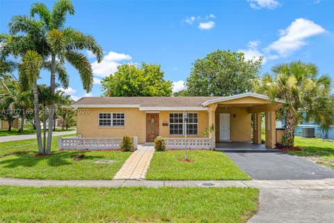 Photo of 4700 NW 41st Pl, Lauderdale Lakes, FL 33319 (MLS # A12071697)