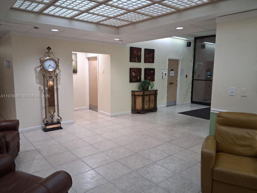 Photo of 1100 St Charles Pl #213, Pembroke Pines, FL 33026 (MLS # A11978689)