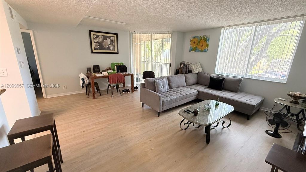 Photo of 4055 W Mcnab Rd #H206, Pompano Beach, FL 33069 (MLS # A12009657)