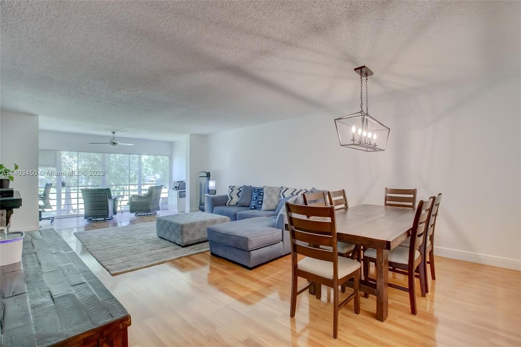 Photo of 4007 N Cypress Dr #208, Pompano Beach, FL 33069 (MLS # A11403450)