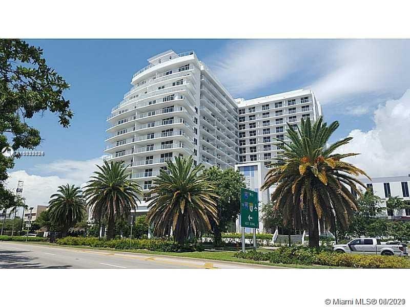UPGRADED COSMOPOLITAN CONDO 2BED/2BATH No carpet! Stunning Porcelain floor throughout! w/EXTENDED LARGE WRAPAROUND BALCONY w/FLOOR TO CEILING HIGH IMPACT WINDOWS OFFERING DRAMATIC VIEWS OF OCEAN,BISCAYNE BAY,MIAMI BEACH SKYLINE. KITCHEN w/PREMIUM EUROPEAN CABINETRY,S/S APPL w/LOW NOISE DISWHWASHER.WASH/DRYER. WALKING DISTANCE TO GROCERY STORES, LUXURY SHOPS & RESTAURANTS IN DESIGN DiSTRICT. SUPERB DESIGNER BUILDING OFFERING LUXURIOUS AMENITIES SUCH AS 55ft long INFINITY POOL w/PRIVATE CABANAS,STATE OF THE ART FITNESS CENTER, LOUNGE AREA,beautiful rooftop terrace with hot tubs and summer kitchen (Water+cable+internet incl).