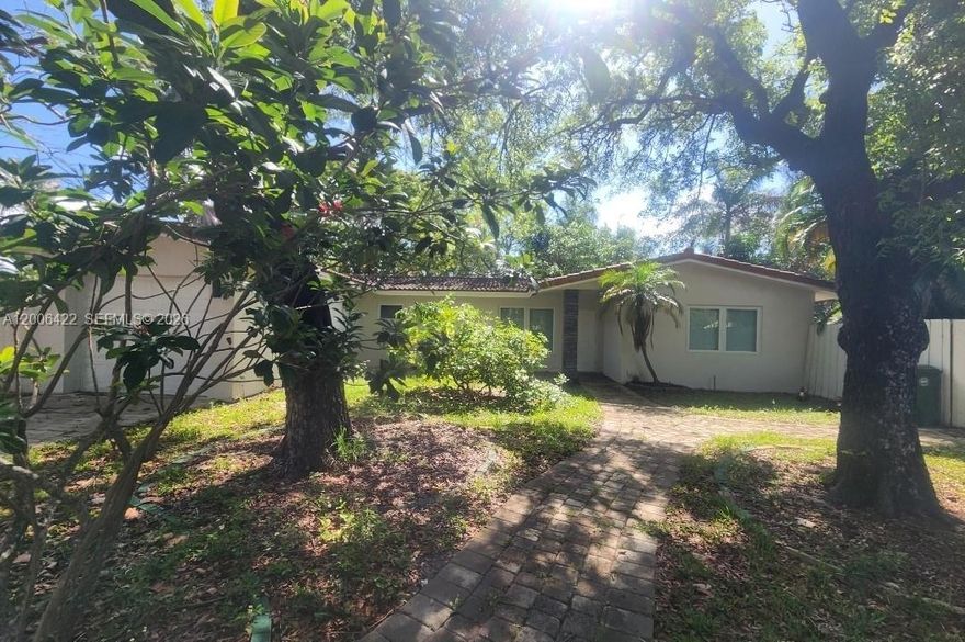 Escape the chaos of everyday life in this serene, recently renovated pool home with an attached 1-car garage in the sought after Wilton Manors neighborhood. Built on an oversized corner lot, this spacious home features a generously sized living/dining room that opens to the kitchen. Recent updates include remodeled kitchen w/stainless appliances and quartz counters (2024) hurricane impact windows and doors, renovated baths, 48 X 48 porcelain tile throughout updated electrical and plumbing systems and a new resurfaced pool w/new pool pump (2023) exterior painted (2023).  Other features include-black out shades in primary bed, newer fixtures, ceiling fans & high hat lighting throughout.  Plenty of parking with a huge circular driveway in the front. Enjoy your relaxing/refreshing pool and your private, fully fenced yard with patio- perfect for entertaining.  Just a 10-minute stroll to the shops and eateries of Wilton Drive, and minutes away from downtown Fort Lauderdale, I-95, FLL airport and the beach. Tranquility and relaxation await you. Quiet Street-No HOA