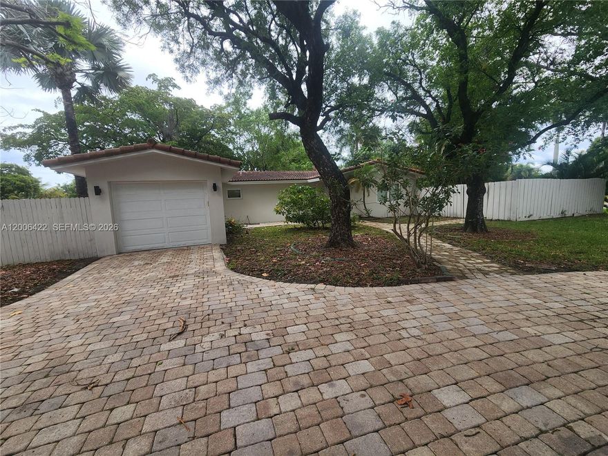 Escape the chaos of everyday life in this serene, recently renovated pool home with an attached 1-car garage in the sought after Wilton Manors neighborhood. Built on an oversized corner lot, this spacious home features a generously sized living/dining room that opens to the kitchen. Recent updates include remodeled kitchen w/stainless appliances and quartz counters (2024) hurricane impact windows and doors, renovated baths, 48 X 48 porcelain tile throughout updated electrical and plumbing systems and a new resurfaced pool w/new pool pump (2023) exterior painted (2023).  Other features include-black out shades in primary bed, newer fixtures, ceiling fans & high hat lighting throughout.  Plenty of parking with a huge circular driveway in the front. Enjoy your relaxing/refreshing pool and your private, fully fenced yard with patio- perfect for entertaining.  Just a 10-minute stroll to the shops and eateries of Wilton Drive, and minutes away from downtown Fort Lauderdale, I-95, FLL airport and the beach. Tranquility and relaxation await you. Quiet Street-No HOA