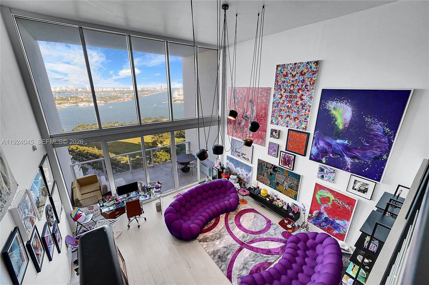 A two-story loft where a 20-foot ceiling transforms 1,794 SQ FT into a dramatic, light-filled stage for the Miami skyline.

Designed by renowned architect Chad Oppenheim with interiors by B&G Design, this 2-bed, 2.5-bath residence centers on a striking double-height living room, a full wall of high-impact glass framing unobstructed views of Biscayne Bay, Miami Beach, the cruise ship terminal, and Maurice A. Ferré waterfront parks that will ensure these views remain open forever.

The kitchen is equipped with Sub-Zero and Wolf appliances, while motorized blackout shades provide instant privacy and comfort. The primary suite occupies the lofted second floor, ensuring complete privacy, and features an expansive layout with a bespoke spa bath.

Living at Ten Museum Park is a lifestyle in itself. This boutique, architect-driven building offers a level of privacy and service rarely found in Miami. Residents enjoy a state-of-the-art spa, multiple pools and a hot tub, sunrise and sunset pool decks, a fully equipped fitness center, and 24/7 concierge, valet, security, and beach club access.

You are just steps from Miami World Center cultural and recreational heart of Miami.