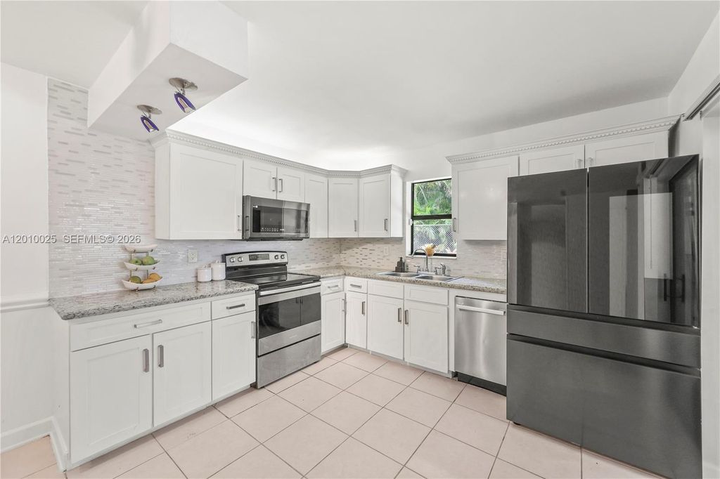 Photo of 9260 SW 61st Way #C, Boca Raton, FL 33428 (MLS # A12010025)